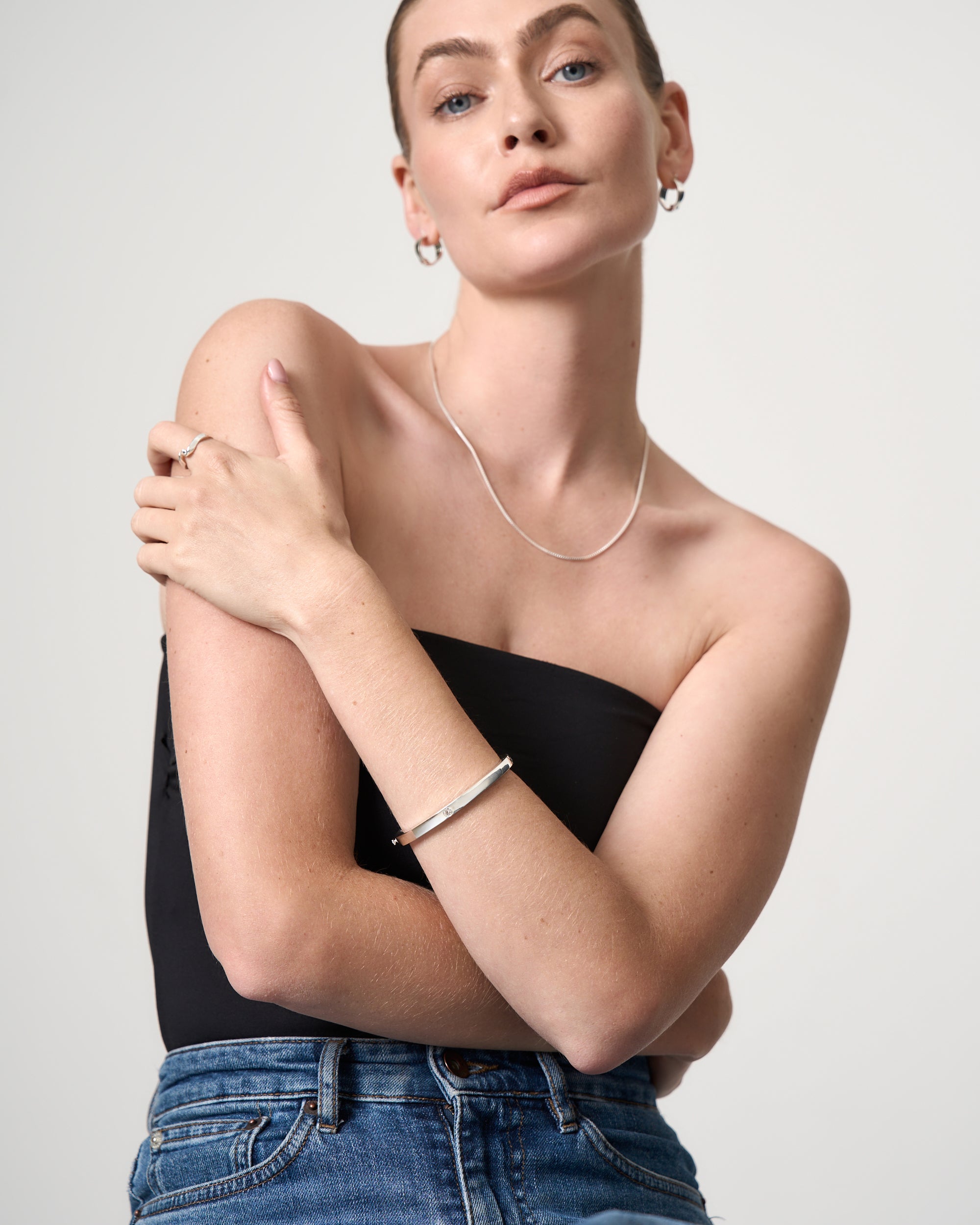 SILVER BANGLE WITH WHITE SAPPHIRE STONE