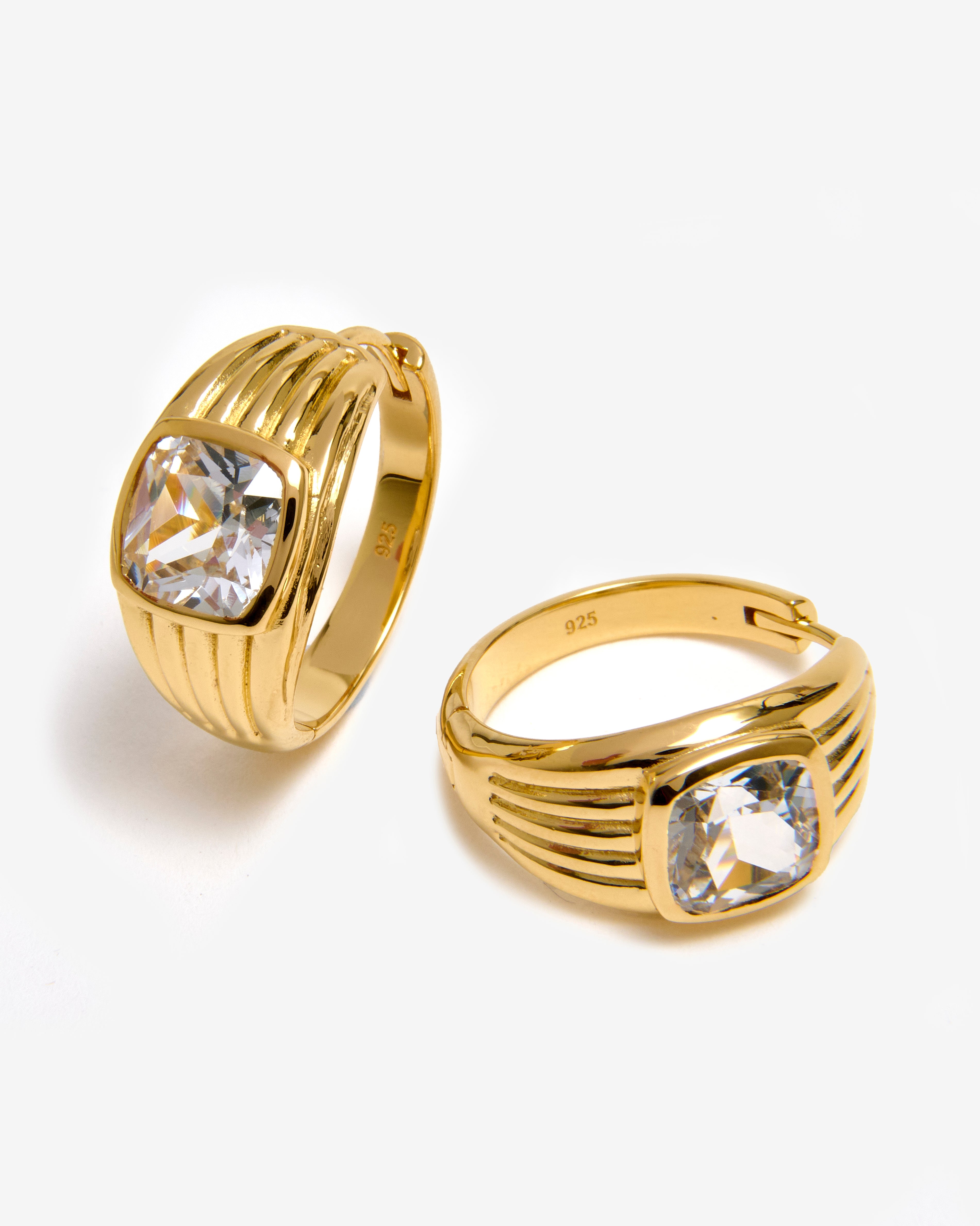Gold vermeil textured huggie earrings with a white sapphire set in the centre