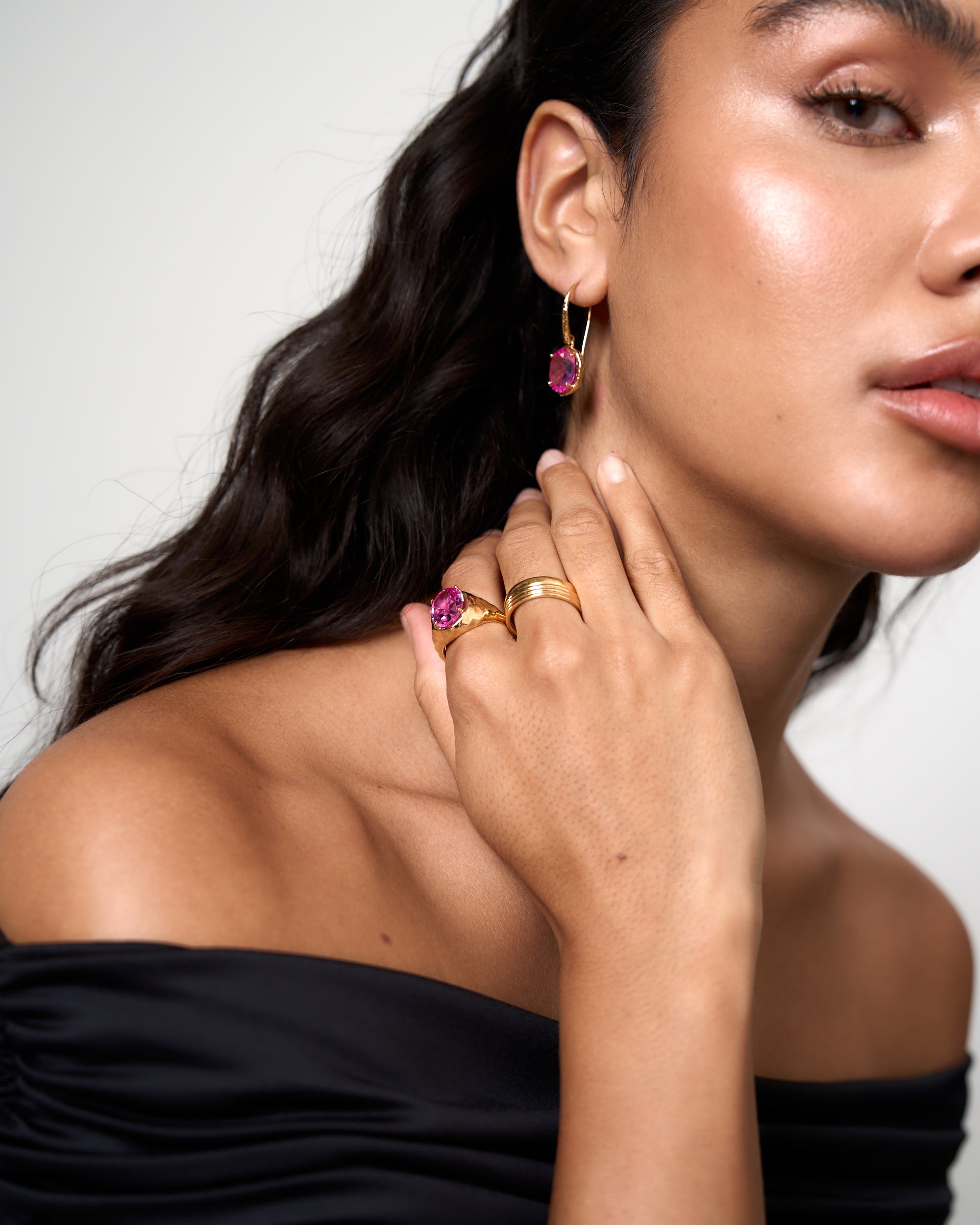 Model wearing Rosa Drop Earrings in pink tourmaline gemstone and gold vermeil by Azora Jewellery