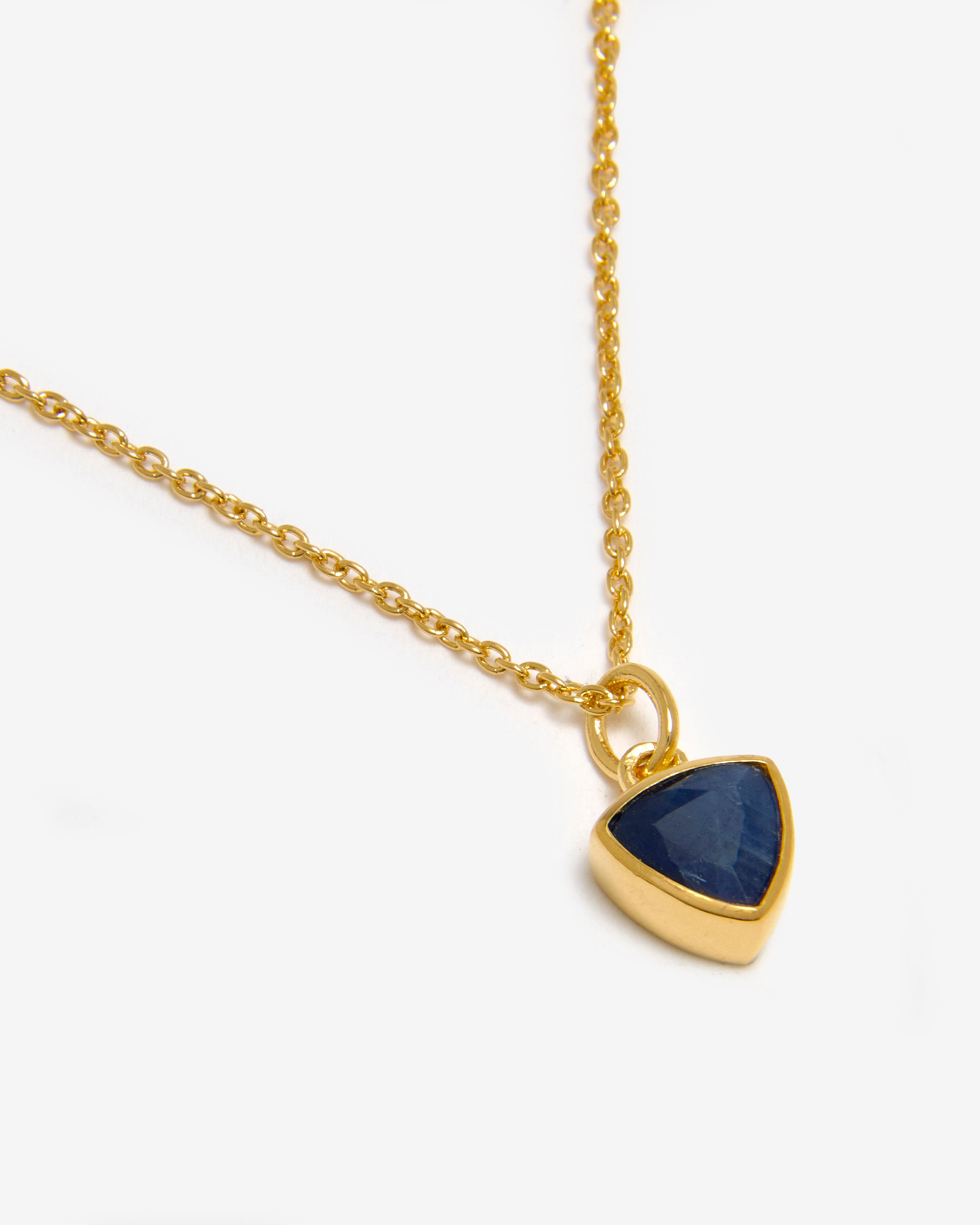 Azora gold vermeil September birthstone necklace with trillion-cut lab-grown blue sapphire pendant