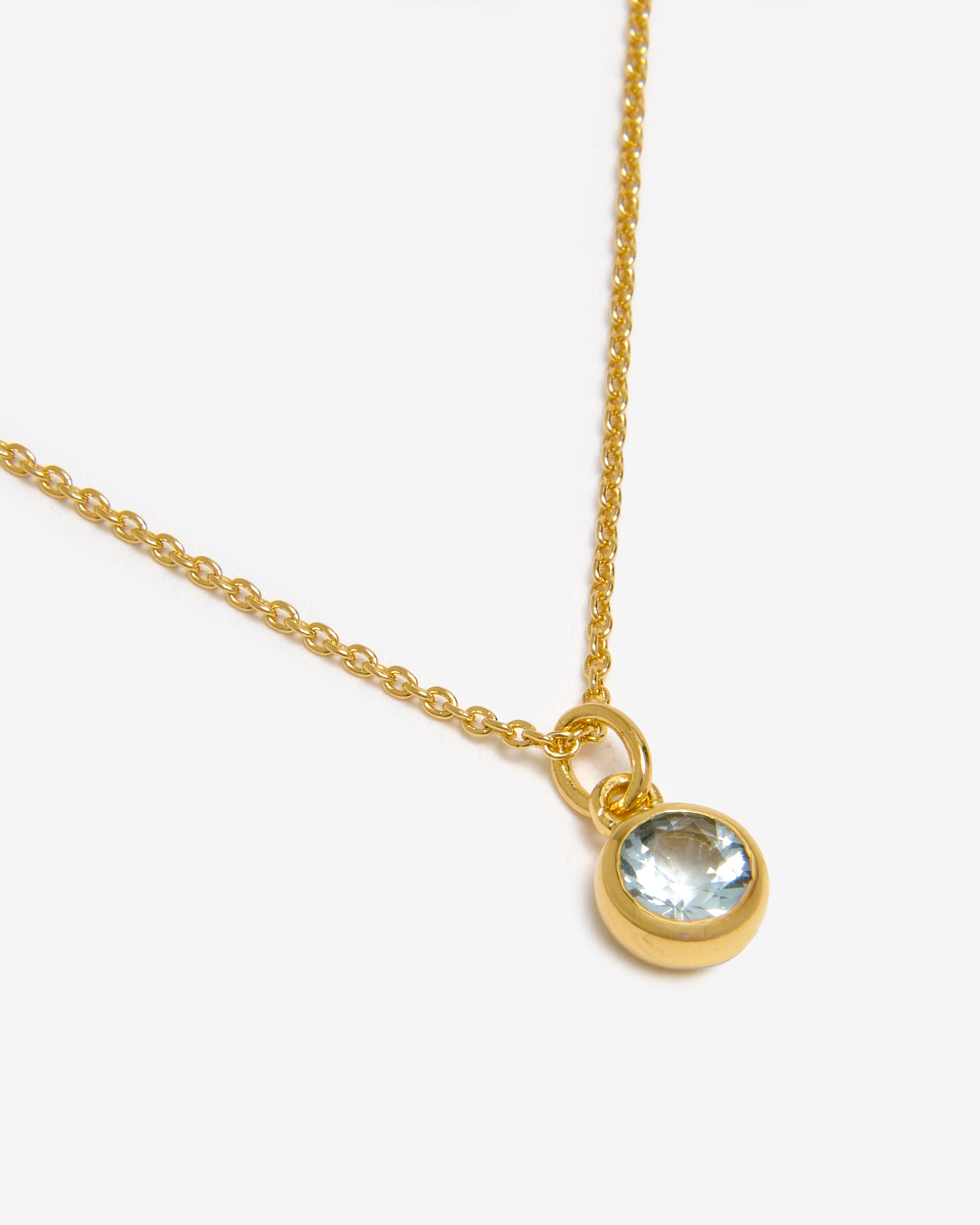 Azora gold vermeil March birthstone necklace with round-cut lab-grown aquamarine pendant
