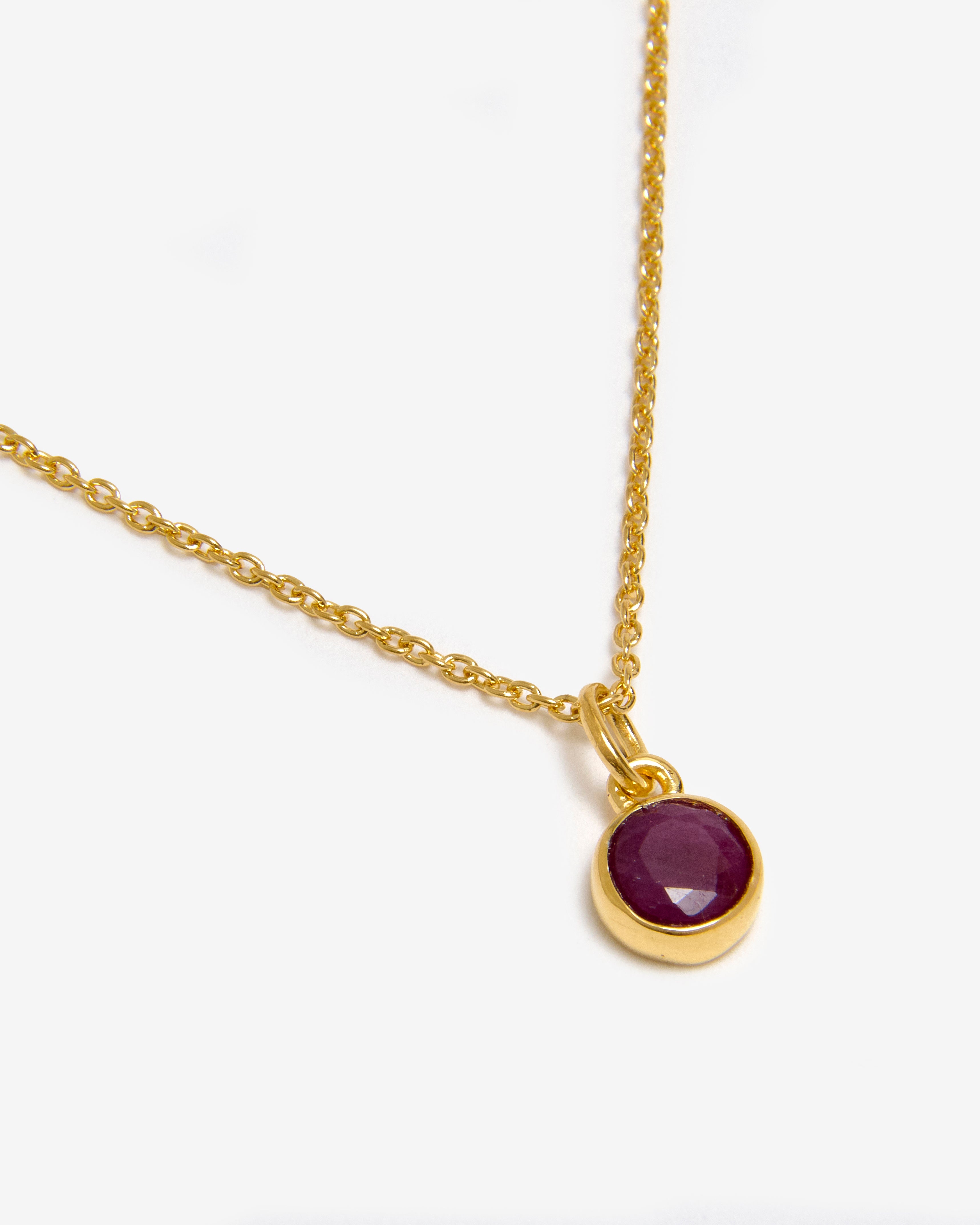 Azora gold vermeil January birthstone necklace with round-cut lab-grown garnet pendant
