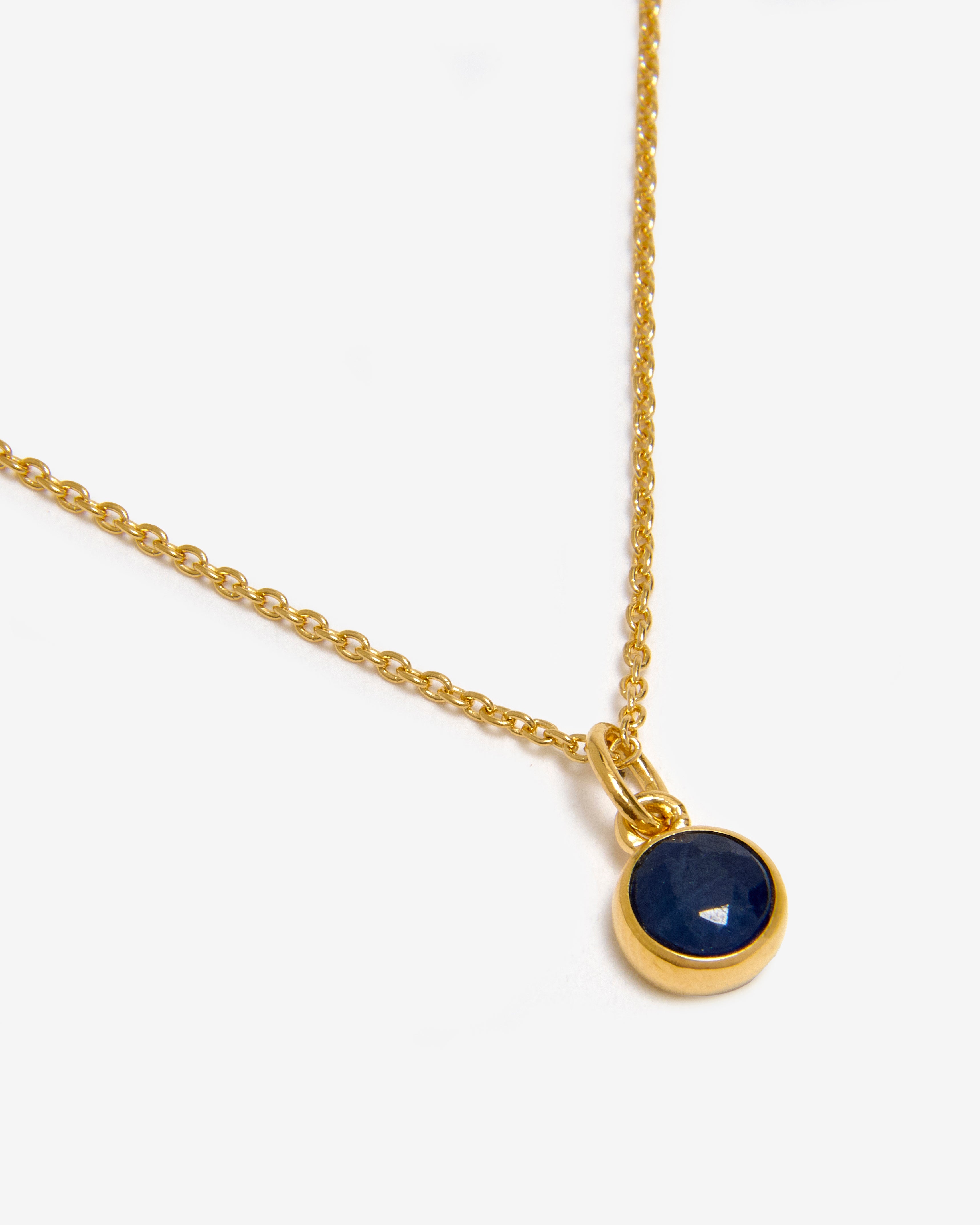 Azora gold vermeil September birthstone necklace with round-cut lab-grown sapphire pendant