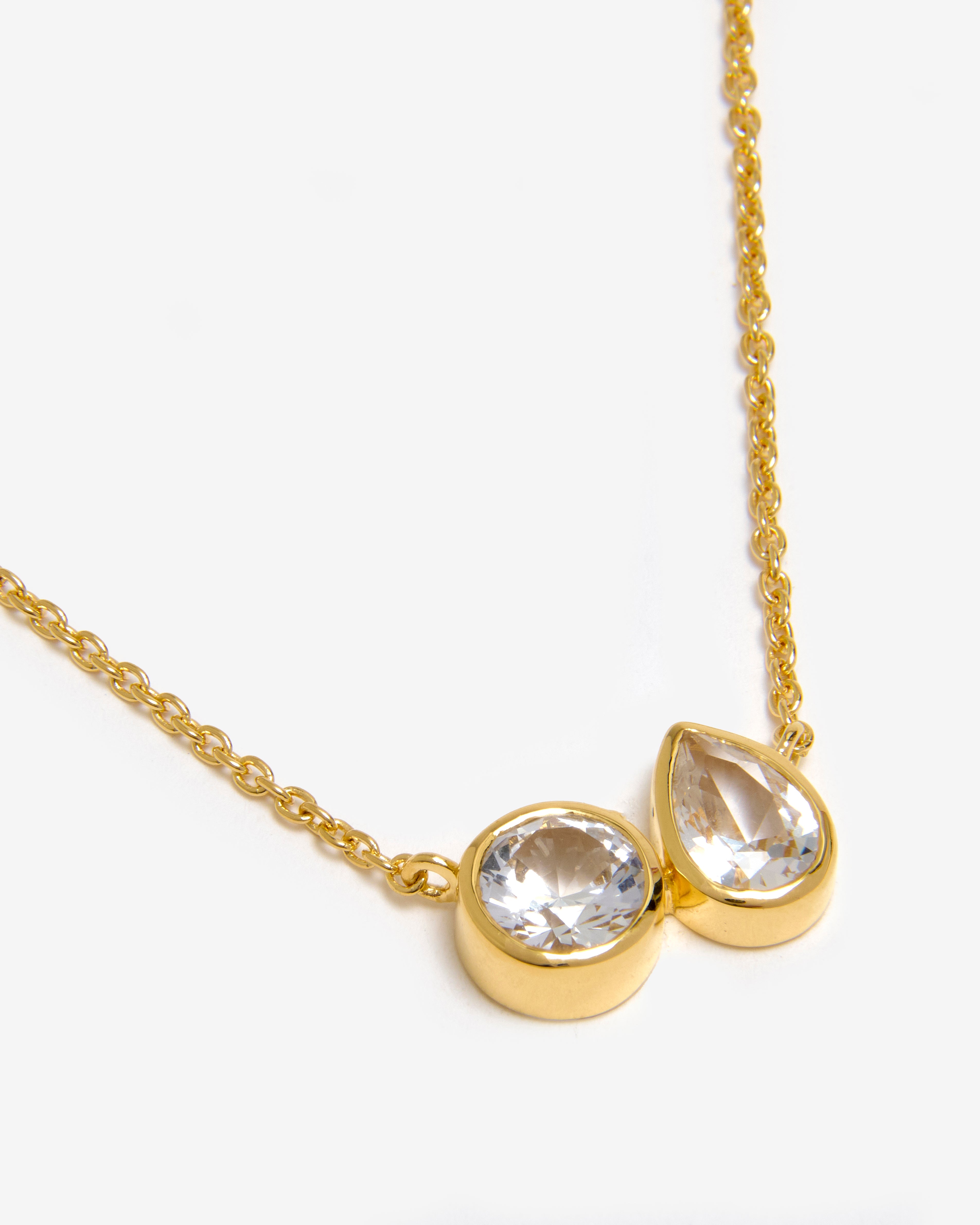 White sapphire cluster necklace in 18ct gold vermeil on white background