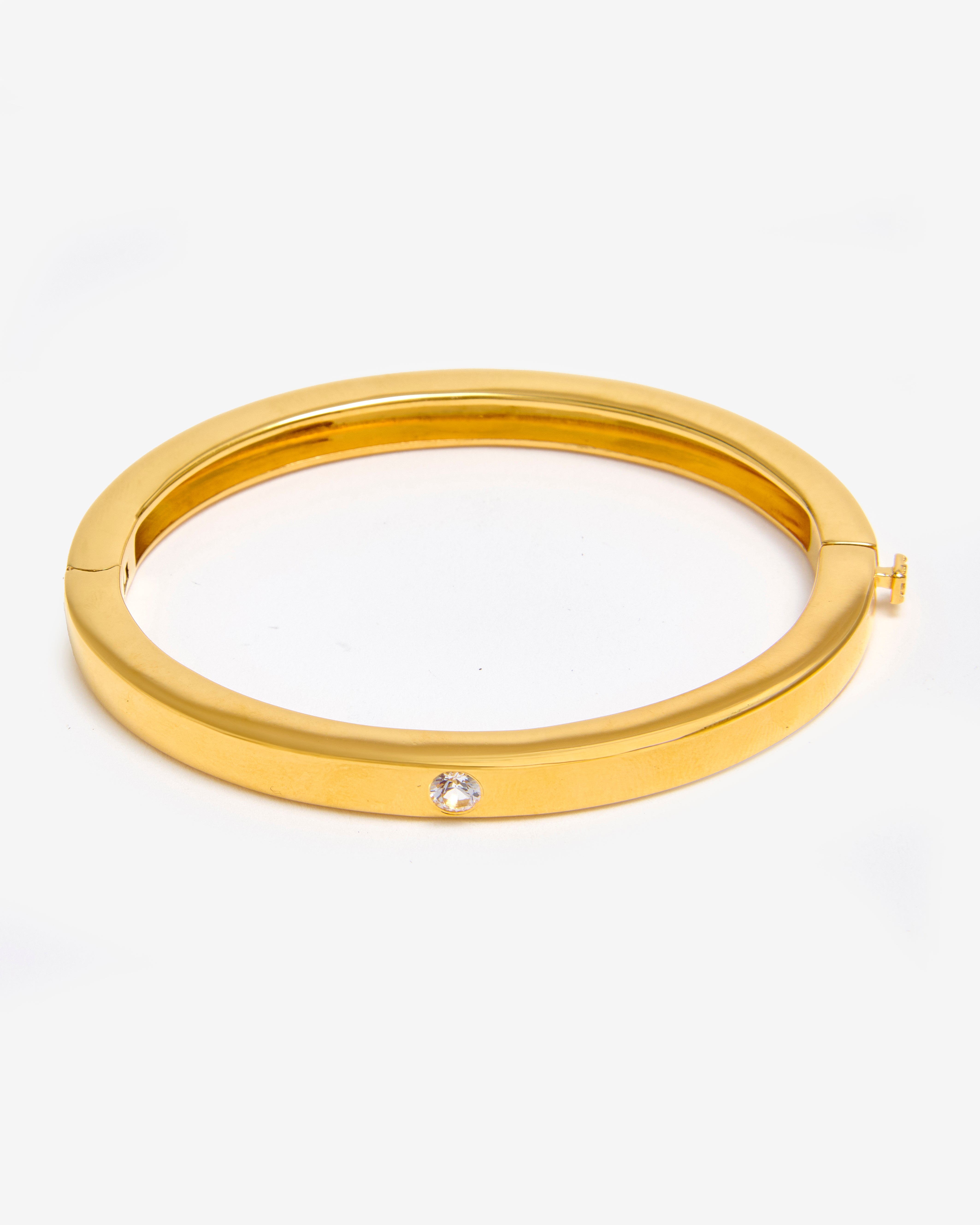 GOLD BANGLE WITH WHITE SAPPHIRE STONE