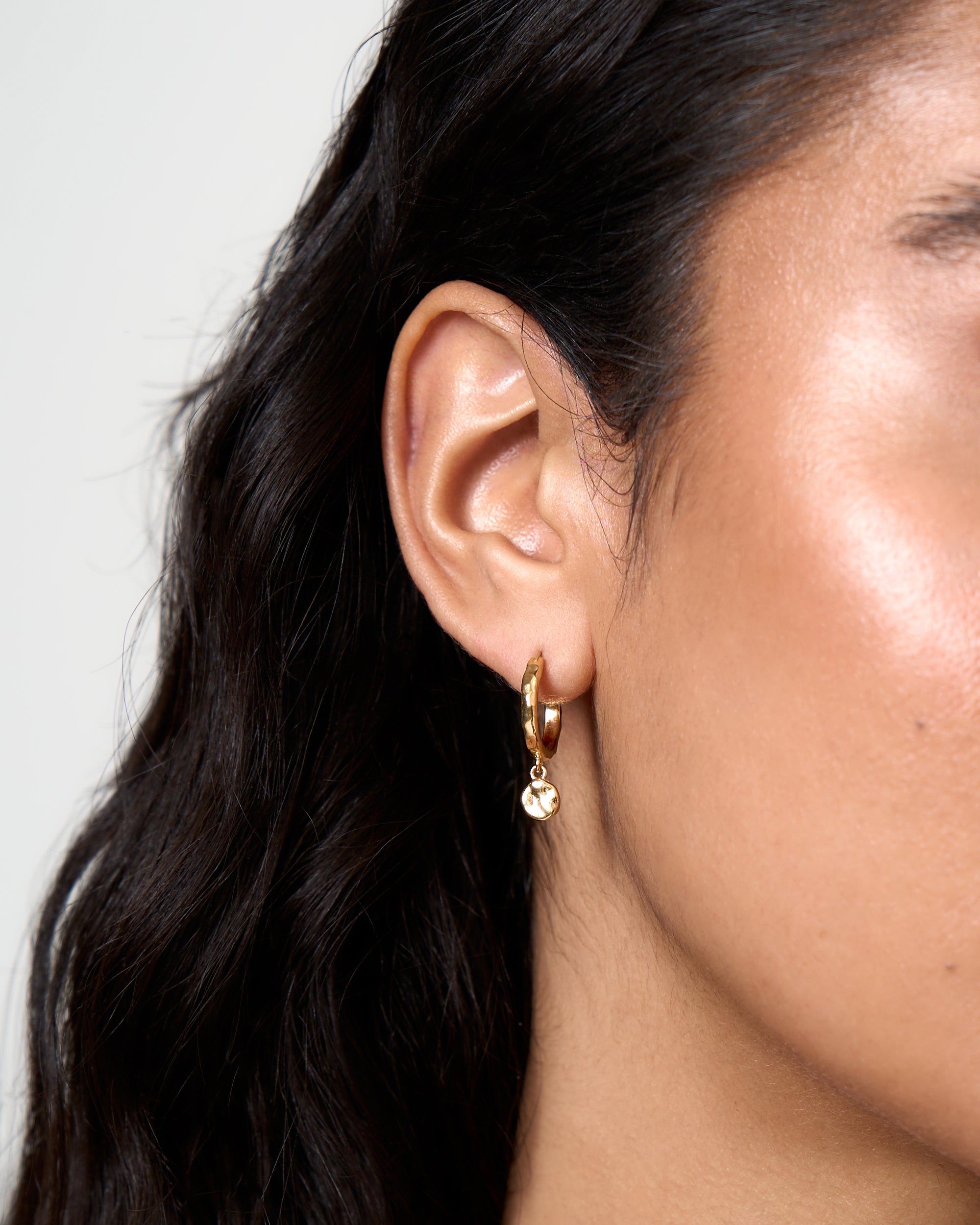 GOLD HAMMERED DISC HOOP EARRINGS