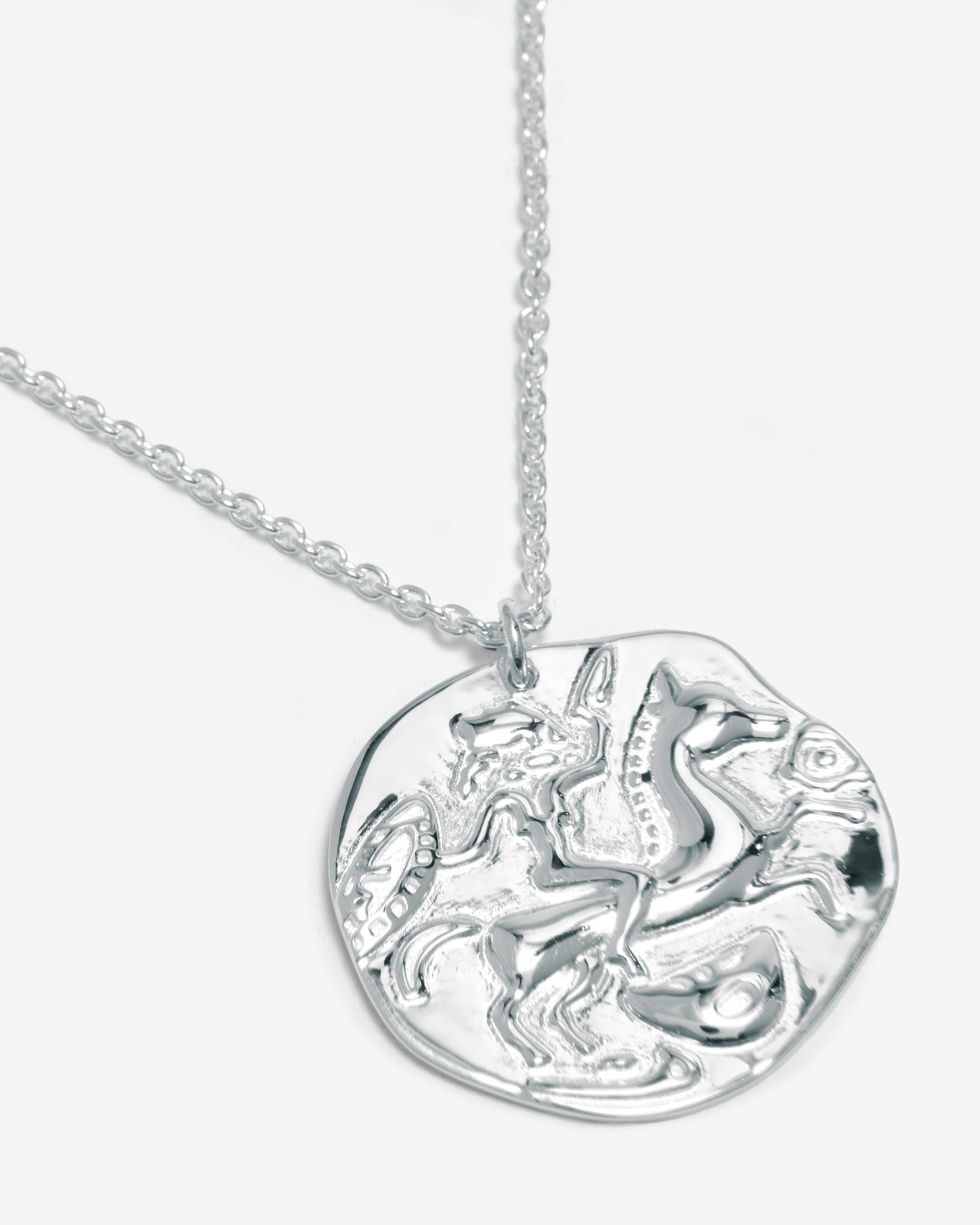 SILVER HAMMERED SUN COIN NECKLACE